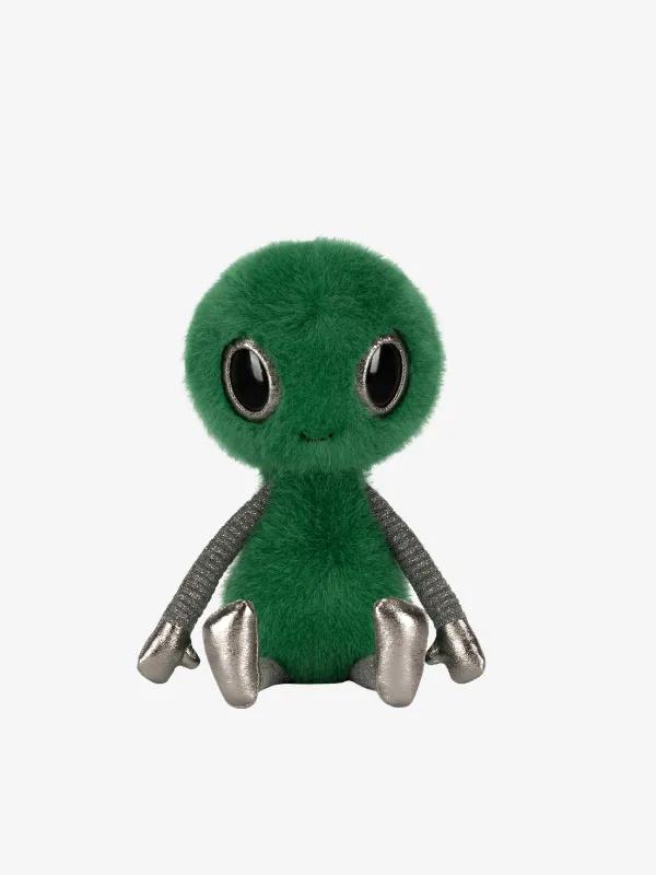 Green plush character with large black eyes and silver arms against a white background